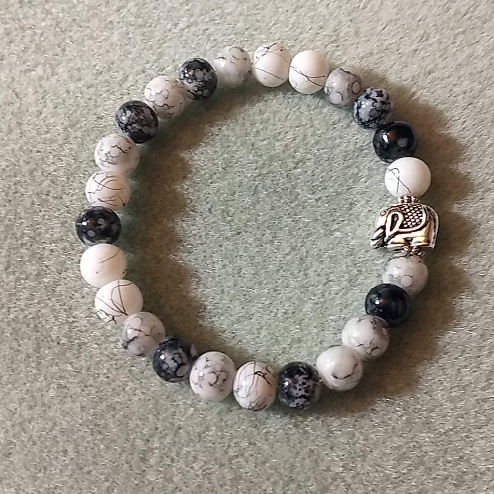Silver elephant and glass bead bracelet